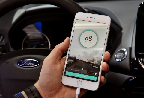 With car insurance premiums on the rise, Ford is first to connect with the new DriverScore® smartphone app that provides a personalized score based on individual driving behavior, which could lead to lower insurance rates. (Photo: Business Wire)