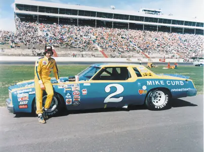  Cup Series Championship in a blue and yellow 1980 Chevrolet Monte Carlo