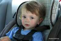 toddler in carseat (select to view enlarged photo)