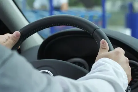 behind the wheel