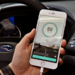 With car insurance premiums on the rise, Ford is first to connect with the new DriverScore® smartphone app that provides a personalized score based on individual driving behavior, which could lead to lower insurance rates. (Photo: Business Wire)