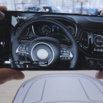 The Accenture-developed app allows car buyers to hold a Tango-enabled device and view, walk around, look inside and configure a life-size virtual Jeep Compass (Photo: Business Wire)