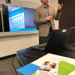 GM Financial employee facilitates financial literacy training for CAPWORKS, a job development initiative by the City of Fort Worth. (Photo: Business Wire)