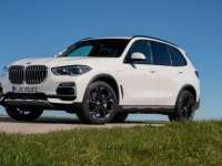 The 2021 BMW X5 xDrive45e PHEV Sports Activity Vehicle. Close-up Look The 2021 BMW X5 xDrive45e PHEV Sports Activity Vehicle. Close-up Look