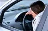 woman sleeping in a car