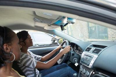 teen and mom in car (select to view enlarged photo)