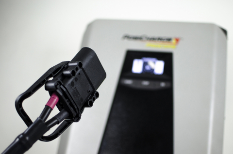 A charging connector equipped with the new advanced ConnectRx feature (Photo: Business Wire)