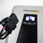 A charging connector equipped with the new advanced ConnectRx feature (Photo: Business Wire)